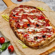 Римская пицца мясное ассорти Фото