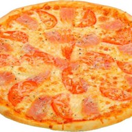 Пицца с ветчиной и сыром Фото