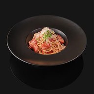 Спагетти в соусе болоньезе Фото