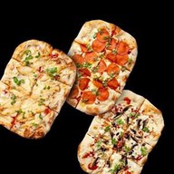 Комбо три пиццы Фото