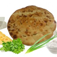 Осетинский пирог с сыром и зеленью Фото