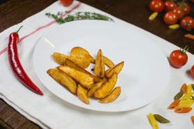 Картофельные дольки со специями - Фото
