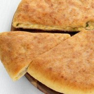 Осетинский пирог с курицей и сыром Фото