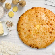 Осетинский пирог с сыром и картошкой Фото