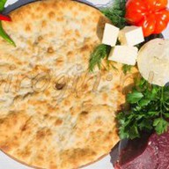 Осетинский пирог с говядиной и сыром Фото
