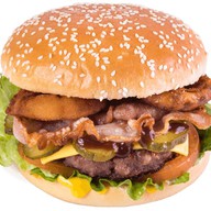 Чизбургер с беконом барбекю Фото