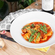 Тортелли с морепродуктами Фото