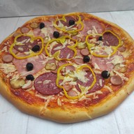 Мясное ассорти пицца Фото