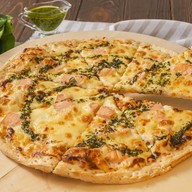 Пицца с семгой и сливочным сыром Фото