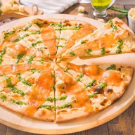 Пицца с семгой-фреш и сливочным сыром Фото