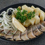 Сельдь с картофелем Фото