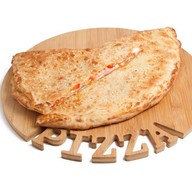 Кальцоне с ветчиной и грибами Фото