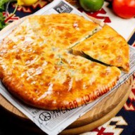 Пирог осетинский с сыром и картофелем Фото