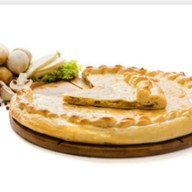 Пирог осетинский с картофелем и грибами Фото