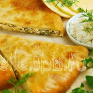 Осетинский пирог зелень, сыр, творог Фото