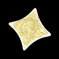 Тертый сыр моцарелла Фото