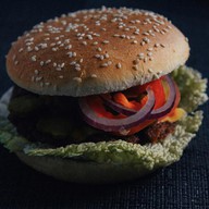 Чикенбургер макси барбекю с беконом Фото