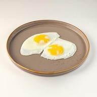 Глазунья из 2 яиц Фото