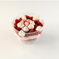 Красный бархат десерт в стакане Фото