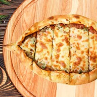 Турецкая пицца пиде с грибами Фото