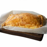 Пирог с сыром и зеленым луком Фото