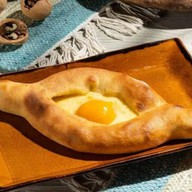 Хачапури по-аджарски Фото