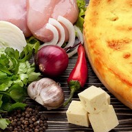 Осетинский пирог с курицей и сыром Фото