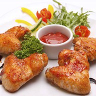 Куриные крылышки фри Фото