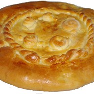 Пирог с картофелем из слоеного теста Фото