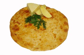 Осетинский пирог с сыром и картофелем - Фото