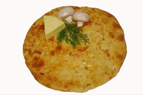 Осетинский пирог с грибами и сыром - Фото