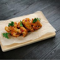 Острые куриные крылышки Фото