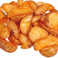 Картофельные дольки Фото