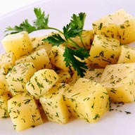 Картофель отварной с зеленью и маслом Фото