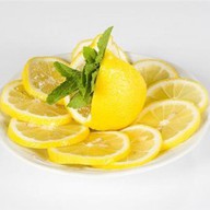 Лимон с сахаром Фото