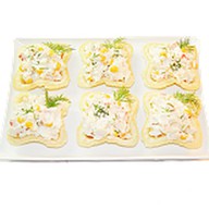 Тарталетки с крабовым салатом Фото