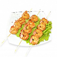 Креветки на шпажках Фото