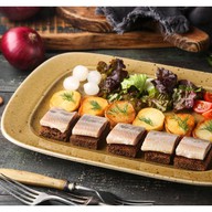 Спинка сельди с картофелем барбекю Фото