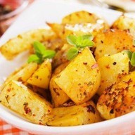 Картофельные дольки запеченные с Фото