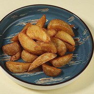 Картофельные дольки Фото