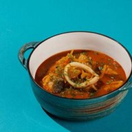 Острый томатный суп с морепродуктами Фото