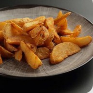 Картофельные дольки с чесночным маслом Фото