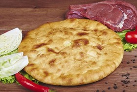 Осетинский пирог с мясом и капустой - Фото