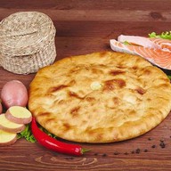 Осетинский пирог с рыбой и картофелем Фото