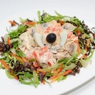 Горячий салат из кальмаров Фото