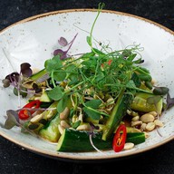 Салат из битых огурцов с орехами Фото