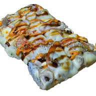 Суши-пицца с морепродуктами Фото