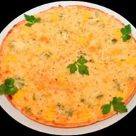 Пицца "Четыре сыра" Фото