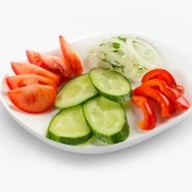 Нарезка из свежих овощей Фото