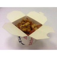 Жареные кальмары с овощами и рисо Фото